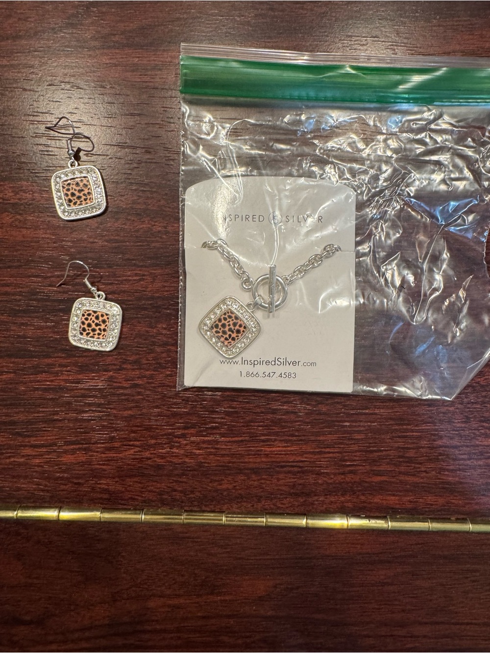 Women's Silver Necklace and Earrings Set with leopard print. NWOT